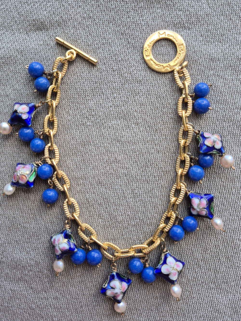 Gold Chain Bracelet with Blue Beads and Floral Charms